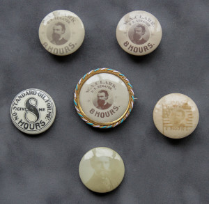 A group of six buttons with the image of an old man.