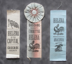 Three ribbons with a ribbon that says helena in the capital, cascade county and anaconda.