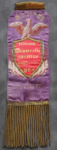 A purple cloth with a red and gold banner on it.