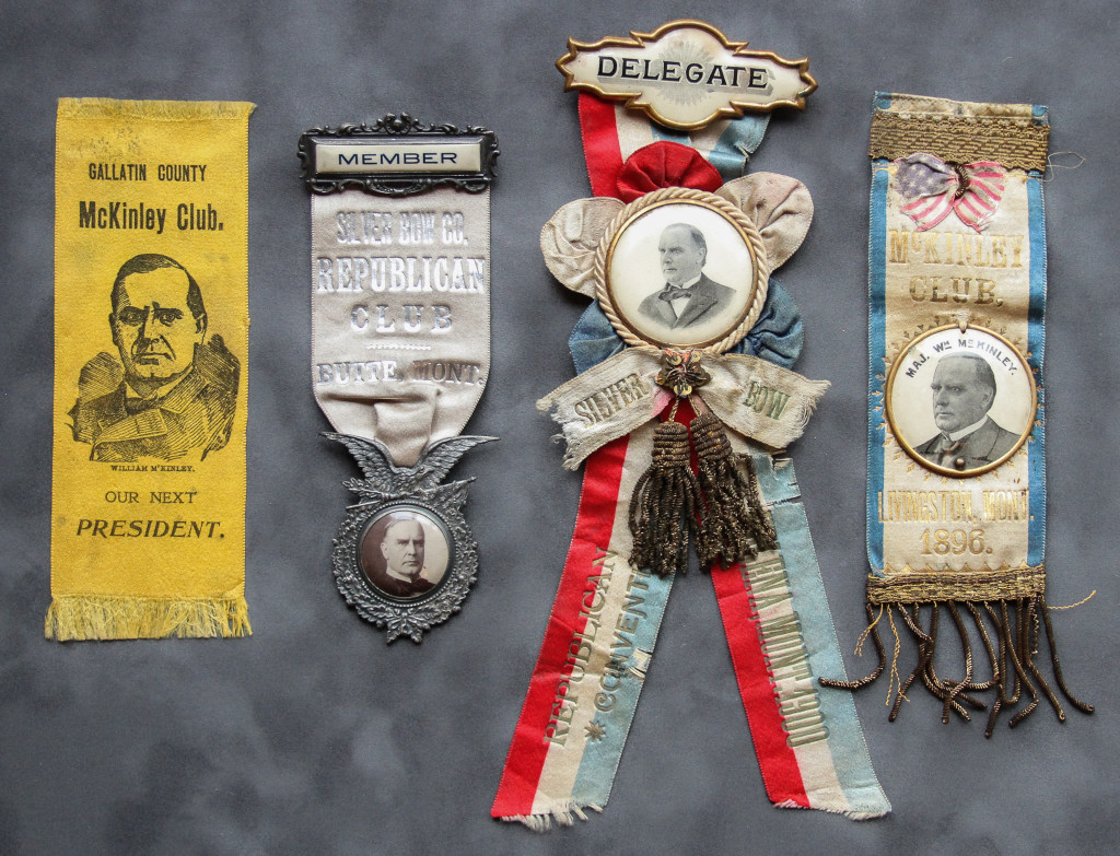 A group of four ribbons with pictures and names on them.