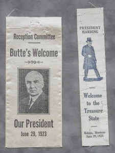 Two old fashioned ribbon banners with a man in uniform.