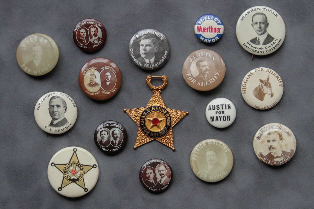 A collection of badges and buttons are displayed.