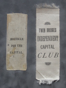 Two bookmarks, one of which is a twin bridges independent capital club.