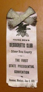 A ribbon with the words young men 's democratic club on it.