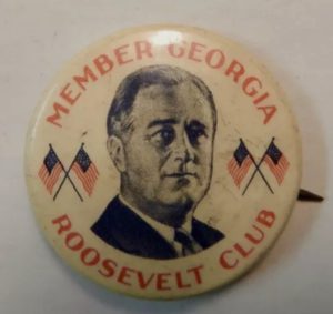 A button with an image of president roosevelt.