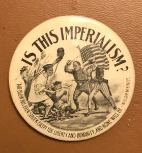 A button with an image of imperialism on it.